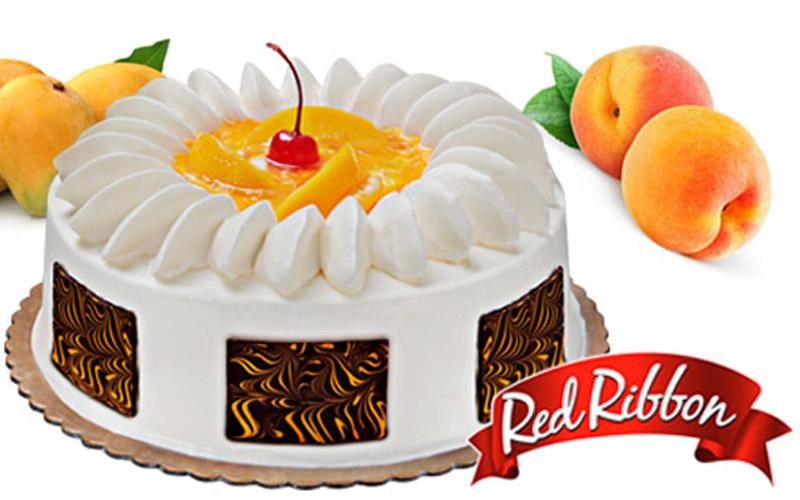 red ribbon mango symphony cake