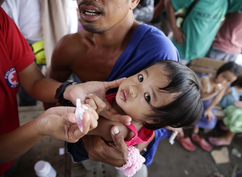Children in the Philippines are being vaccinated to prevent the spread of polio.